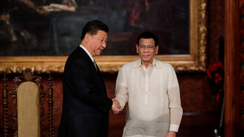 China's President Xi Jinping and Philippine President Rodrigo Duterte 