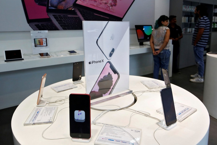 Apple iPhone X mobile phones are seen at an Apple reseller store in Mumbai