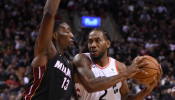 Toronto Raptors forward Kawhi Leonard and Miami Heat center Bam Adebayo (13) 