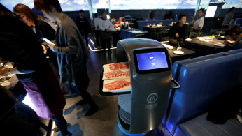 Haidilao's new artificial intelligence hotpot restaurant in Beijing