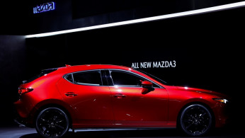 Mazda Corporation introduces the new 2020 Mazda 3 vehicle at the Los Angeles auto show in Los Angeles