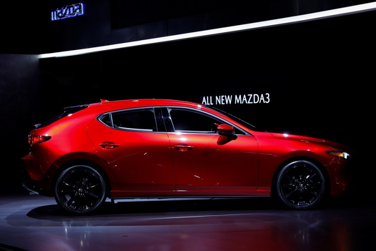 Mazda Corporation introduces the new 2020 Mazda 3 vehicle at the Los Angeles auto show in Los Angeles