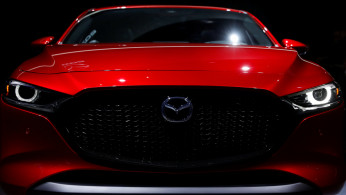 Mazda Corporation introduces the new 2020 Mazda 3 vehicle at the Los Angeles auto show in Los Angeles