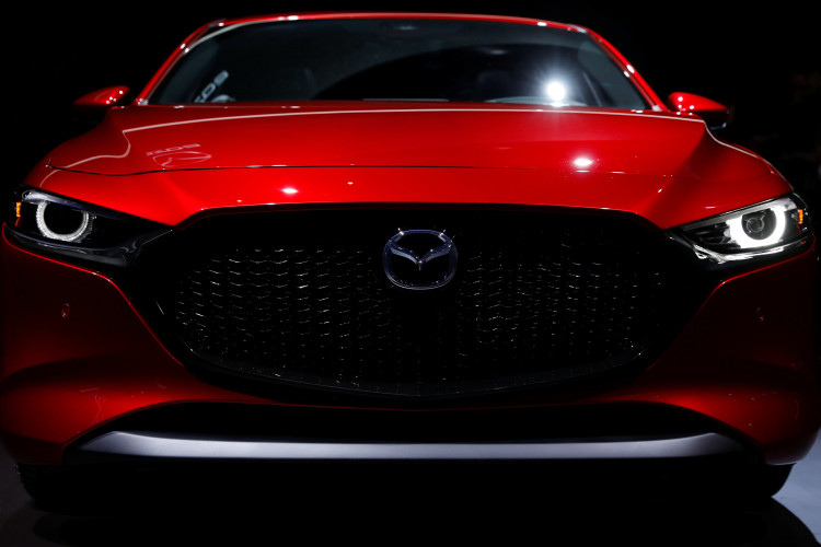 Mazda Corporation introduces the new 2020 Mazda 3 vehicle at the Los Angeles auto show in Los Angeles