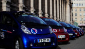 Free2Move Paris electric vehicles by Groupe PSA are displayed outside Paris city hall as the French car maker launches its free-floating car-sharing service in Paris
