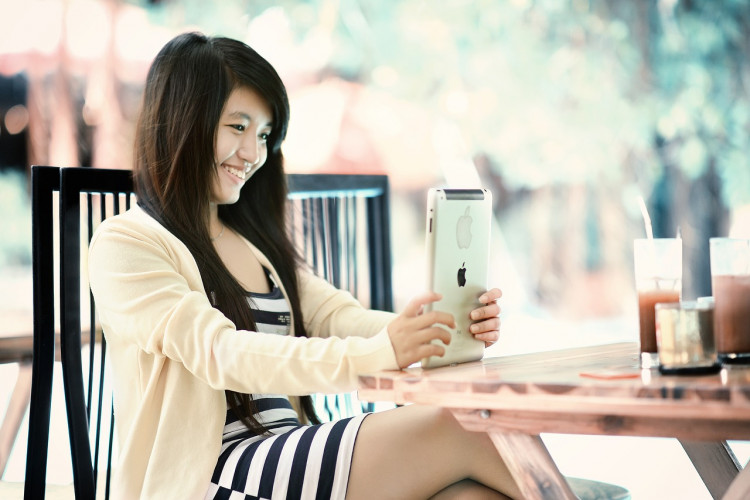 Girl reading From iPad
