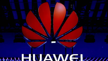 The Huawei logo is seen during the Mobile World Congress in Barcelona
