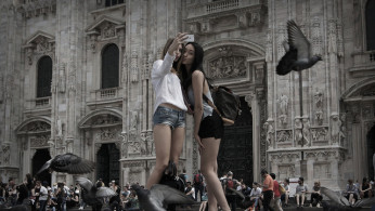 Photo of teens taking a selfie