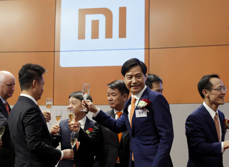 FILE PHOTO: Xiaomi founder Lei Jun attends listing of the company at Hong Kong Exchanges in Hong Kong