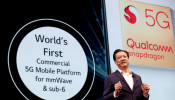 Jim Tran, senior vice president and general manager go handset products for Qualcomm, speaks on the 5G mobile platform during an LG Electronics news conference at the 2019 CES in Las Vegas