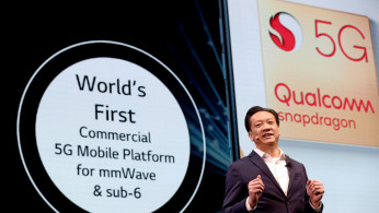 Jim Tran, senior vice president and general manager go handset products for Qualcomm, speaks on the 5G mobile platform during an LG Electronics news conference at the 2019 CES in Las Vegas