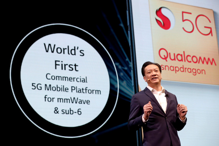 Jim Tran, senior vice president and general manager go handset products for Qualcomm, speaks on the 5G mobile platform during an LG Electronics news conference at the 2019 CES in Las Vegas
