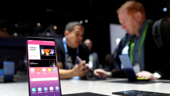 A Galaxy Note9 smartphone is displayed in the Samsung Electronics booth during the 2019 CES in Las Vegas