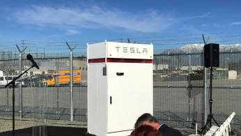 Tesla PowerPack battery storage project is on display during its unveiling in Mira Loma