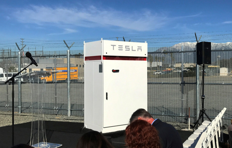 Tesla PowerPack battery storage project is on display during its unveiling in Mira Loma