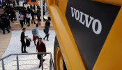 People visit heavy machinery of Volvo at Bauma China