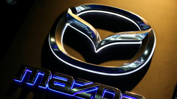 The logo of Mazda is pictured at the 38th Bangkok International Motor Show in Bangkok