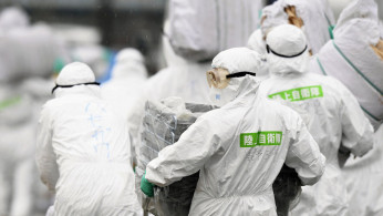 Members of JSDF undergo quarantine operation at hog farm after outbreak of swine fever was detected, in Toyota