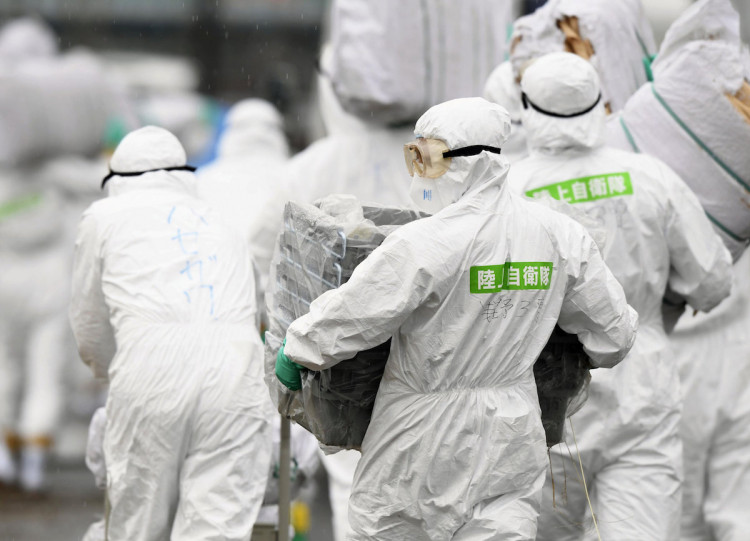Members of JSDF undergo quarantine operation at hog farm after outbreak of swine fever was detected, in Toyota