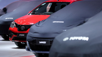 FILE PHOTO - Toyota cars are pictured during the Salao do Automovel International Auto Show in Sao Paulo