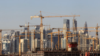 General view of Dubai's cranes at a construction site in Dubai, UAE