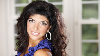 Teresa Giudice Hugs the Limelight with Another Guy