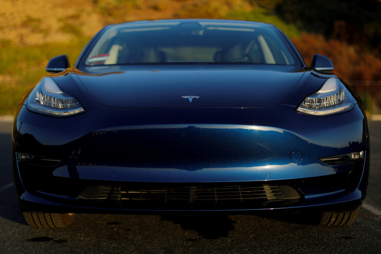 A 2018 Tesla Model 3 electric vehicle is shown in Cardiff, California,