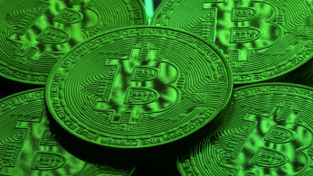 Virtual currency Bitcoin tokens are seen in this illustration picture