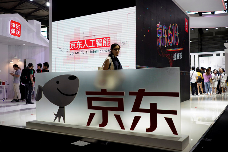 A sign of China's e-commerce company JD.com is seen at CES (Consumer Electronics Show) Asia 2018