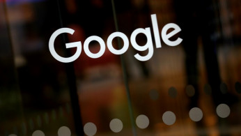 FILE PHOTO: The Google logo is pictured at the entrance to the Google offices in London