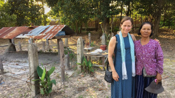 At Pol Pot's cremation site in Anlong Veng with caretaker Mrs Khomsim Sim.