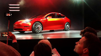 FILE PHOTO: A Tesla Model 3 sedan is displayed during its launch in Hawthorne