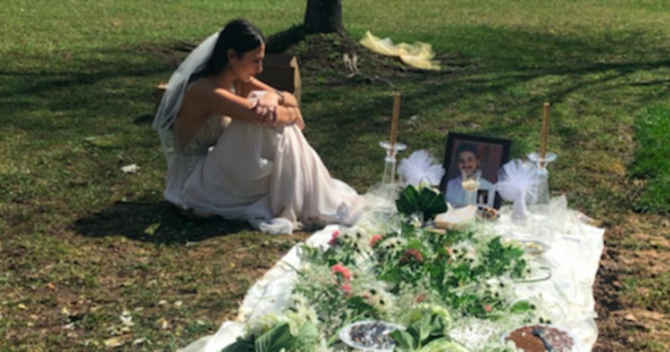 She lost her fiancé to gun violence. The day after she was set to be married, she visited his grave in her wedding dress.