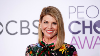 Actress Lori Loughlin arrives at the People's Choice Awards 2017 in Los Angeles.