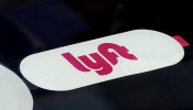 The Lyft logo is seen on ride-hailing car in Manhattan in New York City
