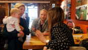 Democratic 2020 U.S. presidential candidate Warren holds a baby in North Hampton.