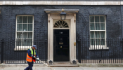 A road sweeper cleans up outside Number 10 Downing Street in London