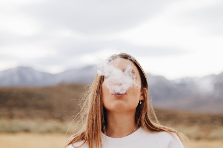 Woman Vaping