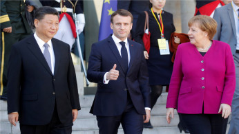French President Emmanuel Macron, German Chancellor Angela Merkel and Chinese President Xi Jinping