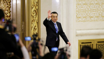 Premier Li Pledges to further open up financial sector at Boao Forum