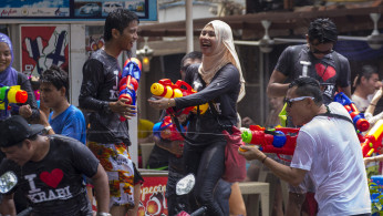 In Thailand, Cambodia, Myanmar, and Laos, people enjoy the festivity with water fights. 