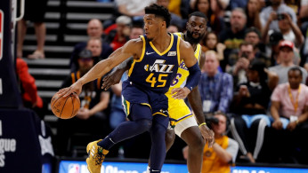 Utah Jazz guard Donovan Mitchell (45) puts a move on Los Angeles Lakers guard Lance Stephenson (6)