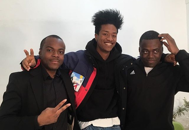 Jonathan Thon, on the right, featured here with the Nigerian-Korean model Han Hyun-Min, center, and Rabbi Thon, his brother, on the right. 