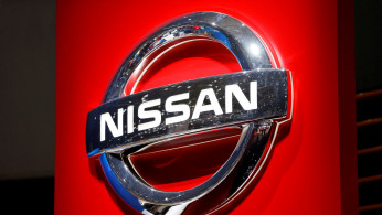 A Nissan logo is displayed at the 89th Geneva International Motor Show