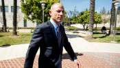 Attorney Michael Avenatti leaves court after making an initial appearance on charges of bank and wire fraud at federal court in Santa Ana, California