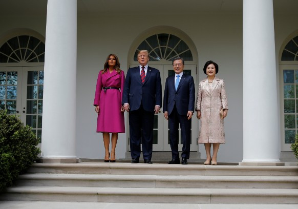 Melania Trump Strikes A Pose In $4750 Wrap With POTUS and South Korean Leader Post Copycat Wedding Accusation