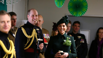 Britain's Prince William and Catherine, Duchess of Cambridge enjoy a pint of Guinness after attending the St Patrick's Day Parade in Cavalry Barracks in Hounslow, Britain March 17, 2019. 
