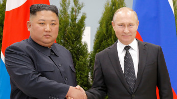 North Korean leader Kim Jong Un shakes hands with Russian President Vladimir Putin in Vladivostok