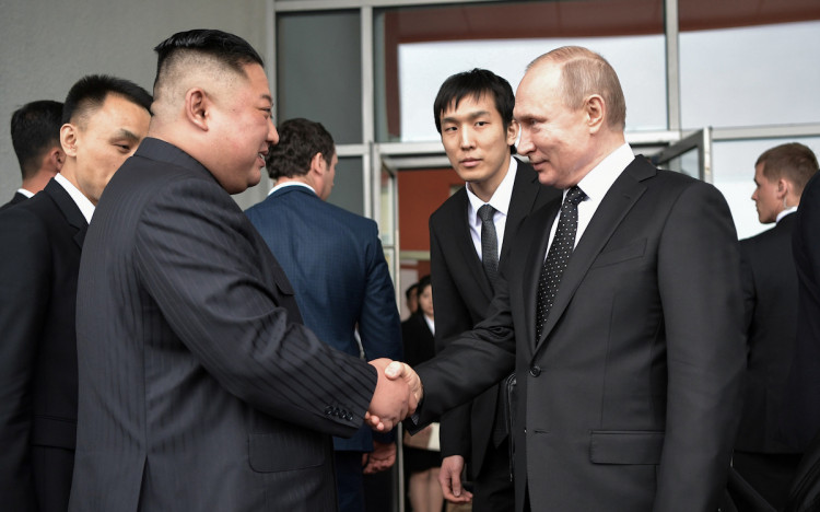Russian President Vladimir Putin shakes hands with North Korea's leader Kim Jong Un following their talks in Vladivostok