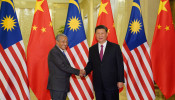 Mahathir bin Mohamad and Xi Jinping